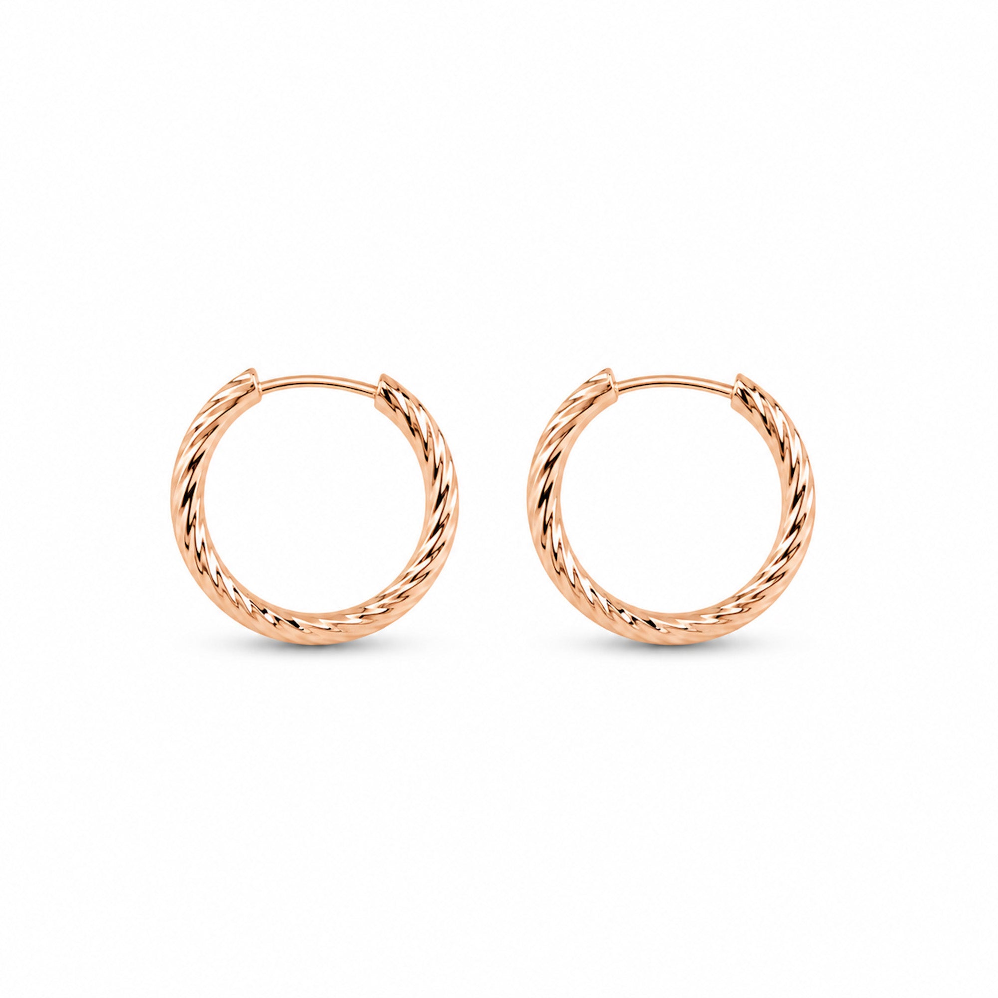 Elegante roségoldene Creolen
